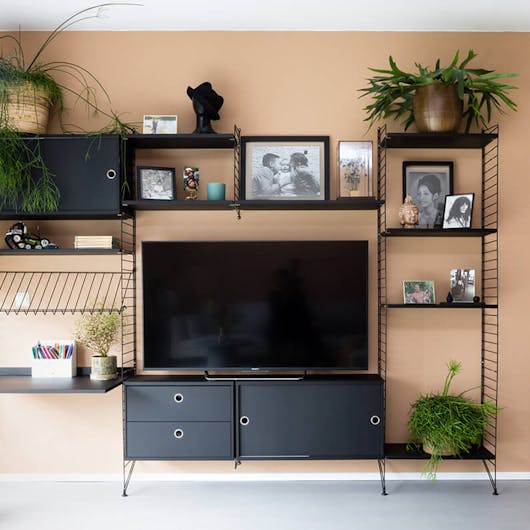Woonidee lange wand grote woonkamer Eijerkamp